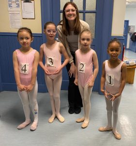 Photo of Leica Hardy School of Dance Ballet Primary 2026 ballet exam participants with instructor, Michelle Lehman.